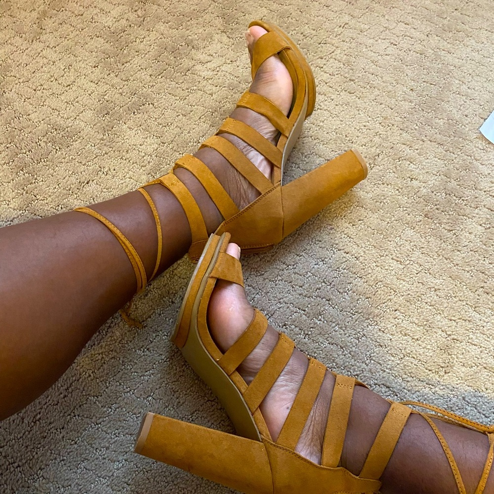 Brown 4.5 inch size 9 lace-up heels